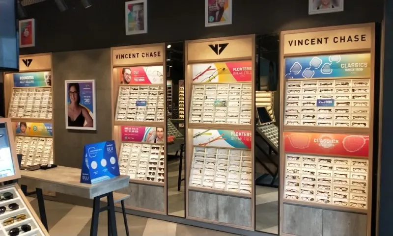 A variety of glass frames arranged on shelves in a Lenskart store