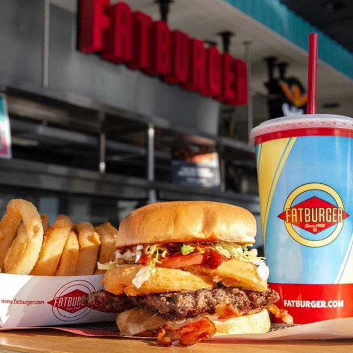 Fries, burger and a beverage by Fatburger