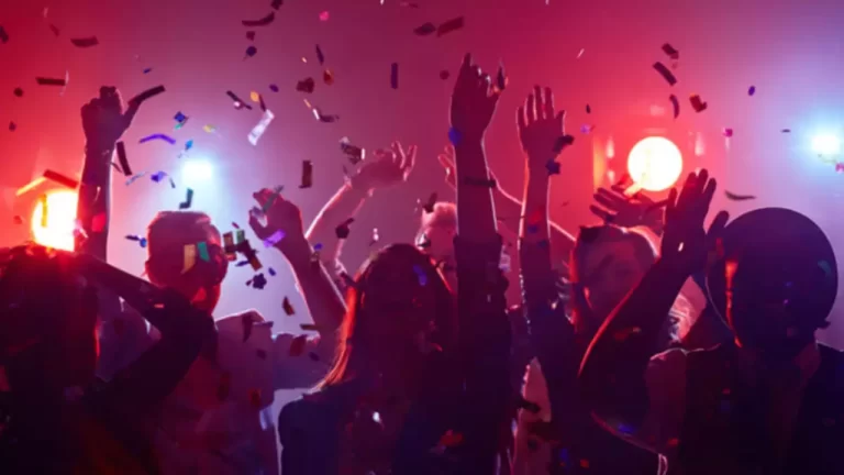 An image of a people dancing at nightclub