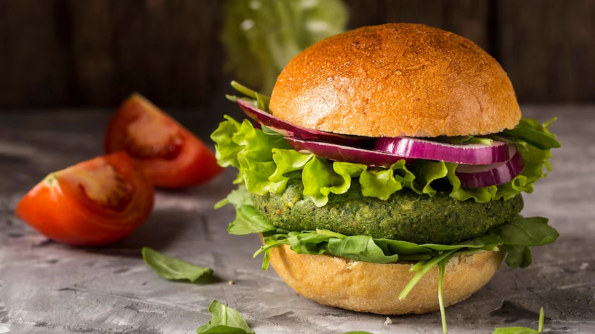 Classic burger featuring simple ingredients like lettuce, tomato, cheese and a juicy patty.