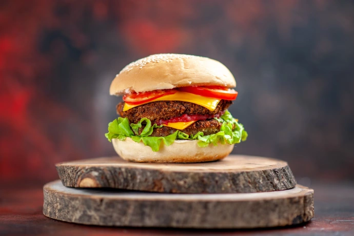 Veggie burger with a colorful veggie patty and fresh toppings.