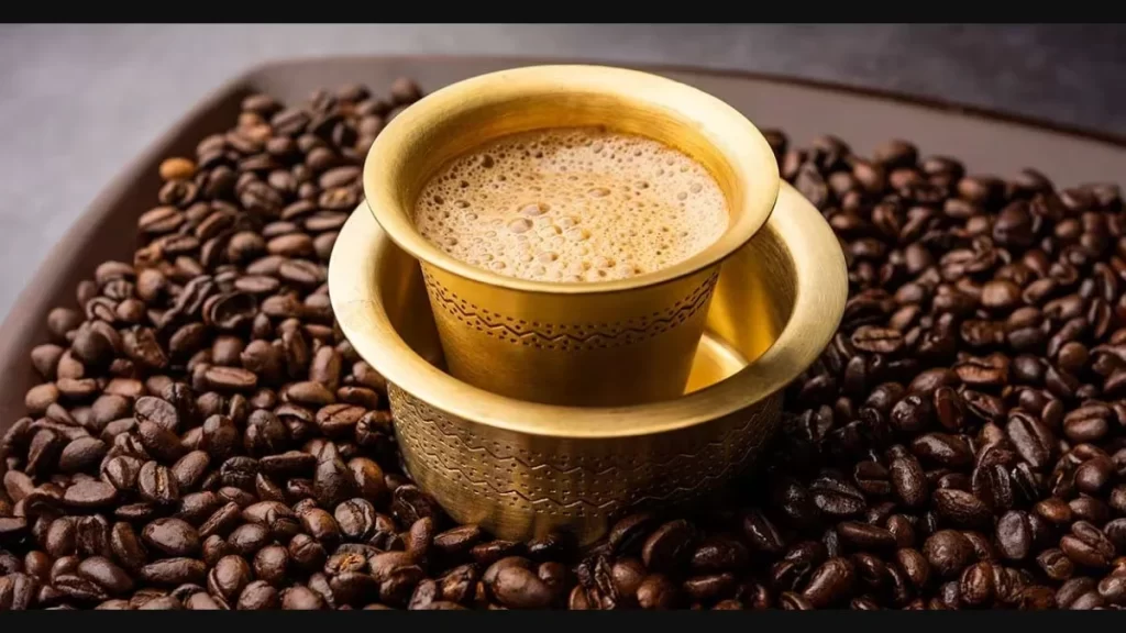 Close-up of a cup of fresh organic Filter (Filer Kaapi) coffee on a wooden table